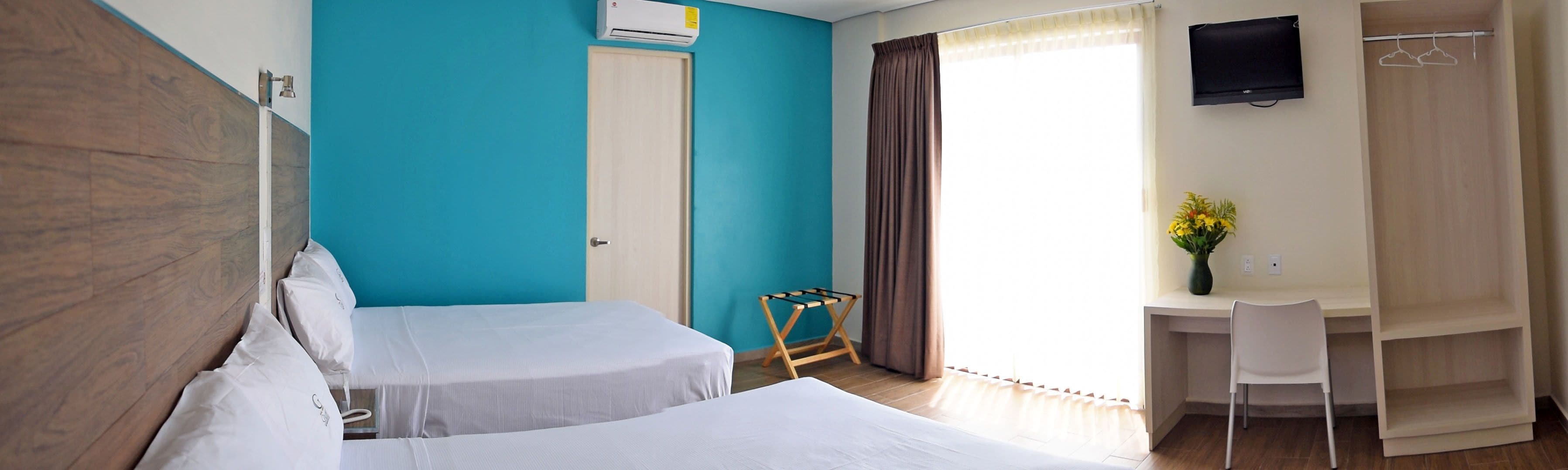 desk, laptop workspace, blackout curtains, iron/ironing board