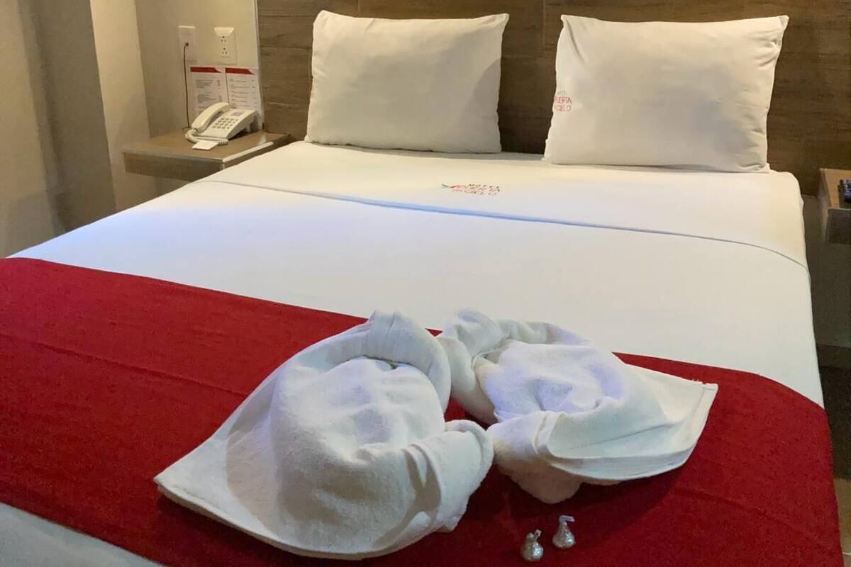 Desk, laptop workspace, blackout curtains, iron/ironing board