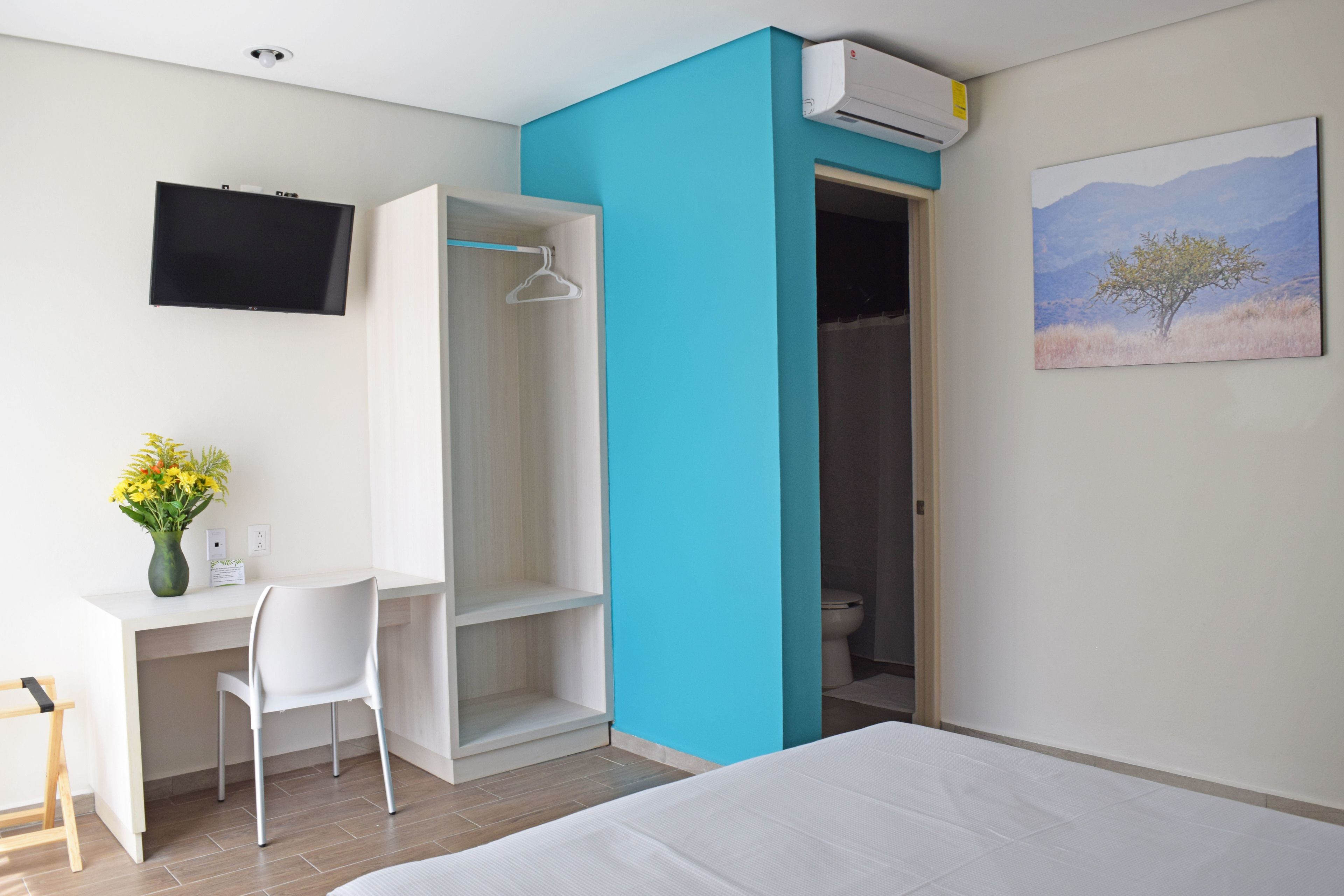 master suite | desk, laptop workspace, blackout curtains, iron/ironing board