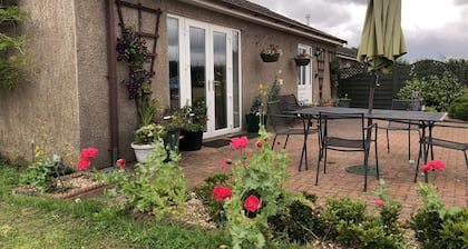 Vieraile Walesissa 4 tähden luokitellulla, itsepalveluperiaatteella, kahden makuuhuoneen omakotitalo-bungalowilla
