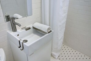 Shower, towels, soap, shampoo