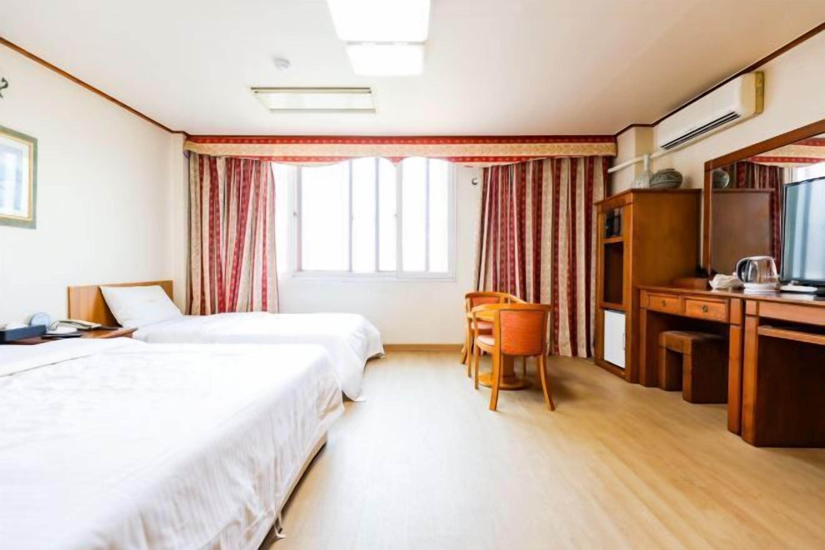 Desk, laptop workspace, blackout curtains, free WiFi