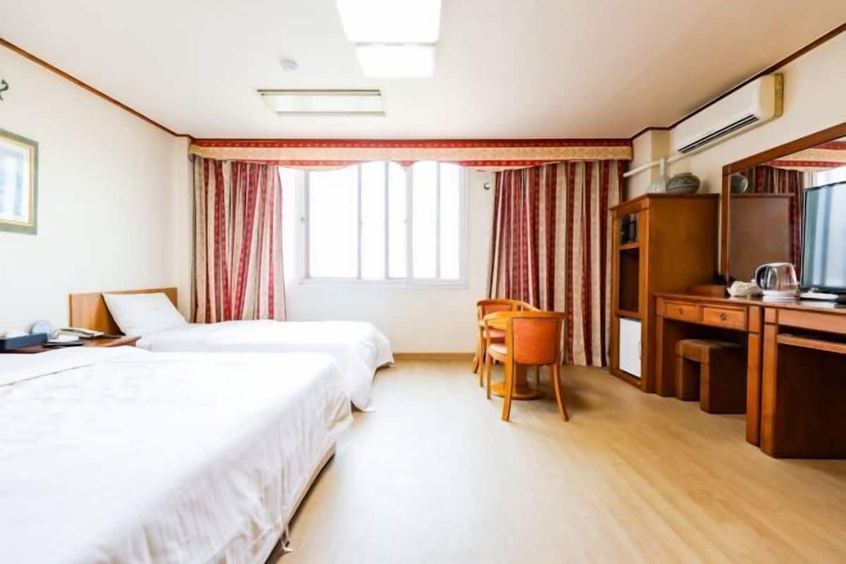 Desk, laptop workspace, blackout curtains, free WiFi