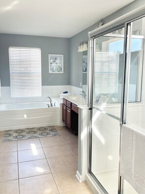 Combined shower/tub, hair dryer, towels, toilet paper