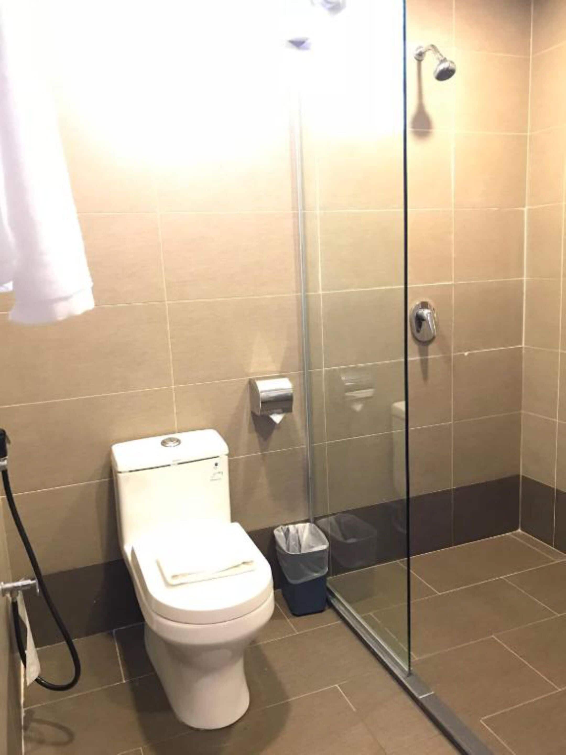 two bedroom suite | bathroom | shower, free toiletries, bidet, towels