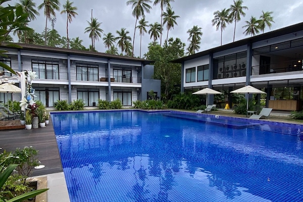 Outdoor pool, open 6:00 AM to 10:00 PM, free cabanas