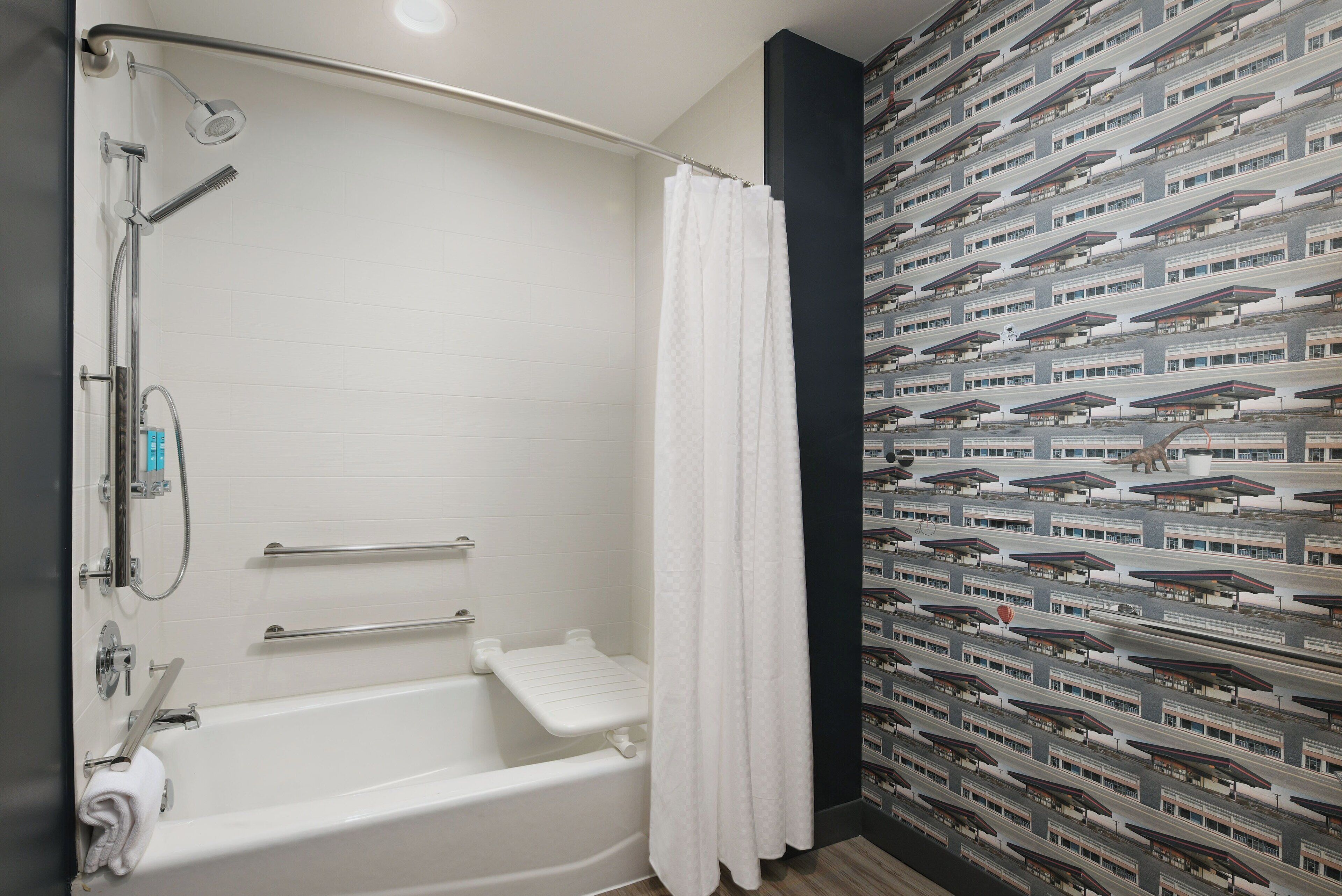 rainfall showerhead, designer toiletries, hair dryer, towels