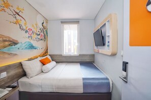 Superior Room | Free WiFi, bed sheets - Front One Budget Hotel Slamet Riyadi Solo (Surakarta)