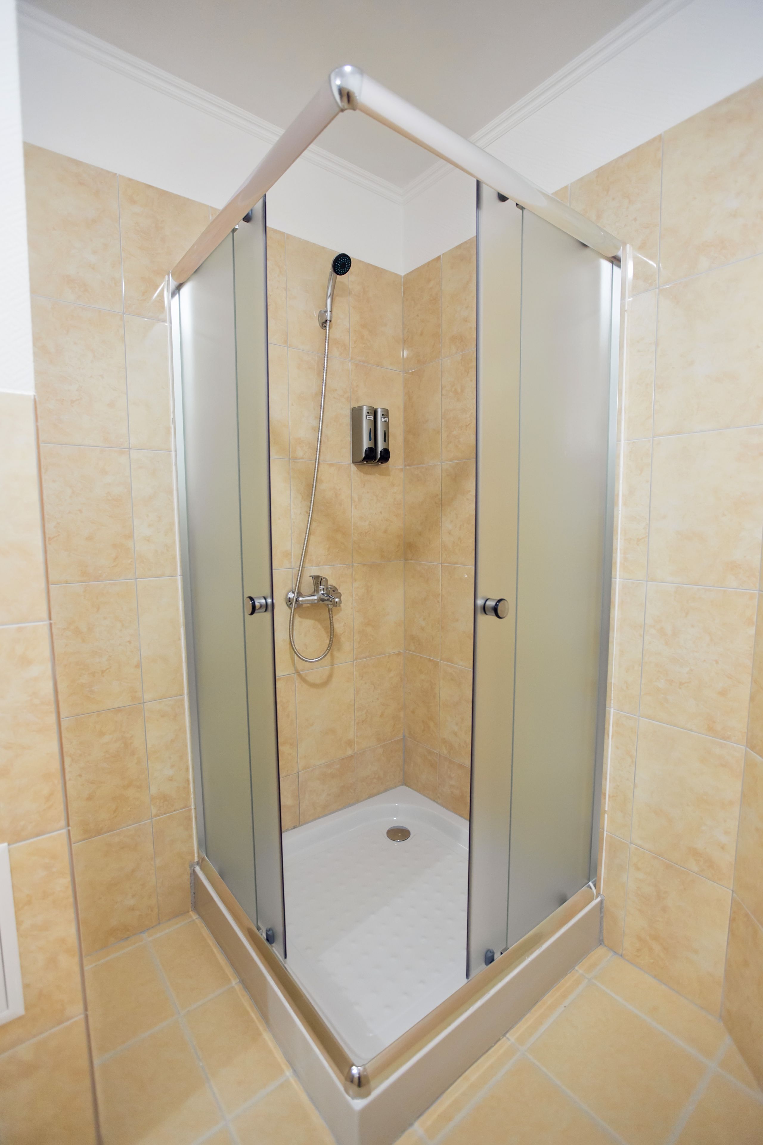 Comfort Room | Bathroom | Hair dryer, slippers, towels