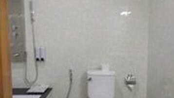 Economy Single Room, Shared Bathroom | Bathroom | Shower, hair dryer, soap, shampoo
