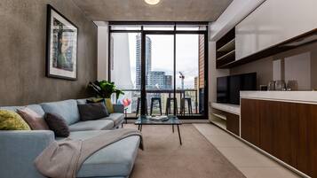 Design Apartment, City View | Living area | TV