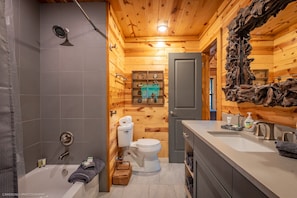 Combined shower/tub, hair dryer, towels, soap