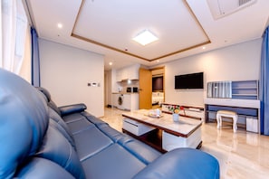 Familiesuite | Oppholdsrom | Flatskjerm-TV