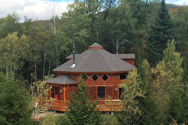Welcome to Owl Roost, aka "The Yurt"! A very unique building, it's inspired by a luxury yurt, but in the log style that people love, and with all the comforts of a modern home - including central air/heat, stainless appliances, etc.