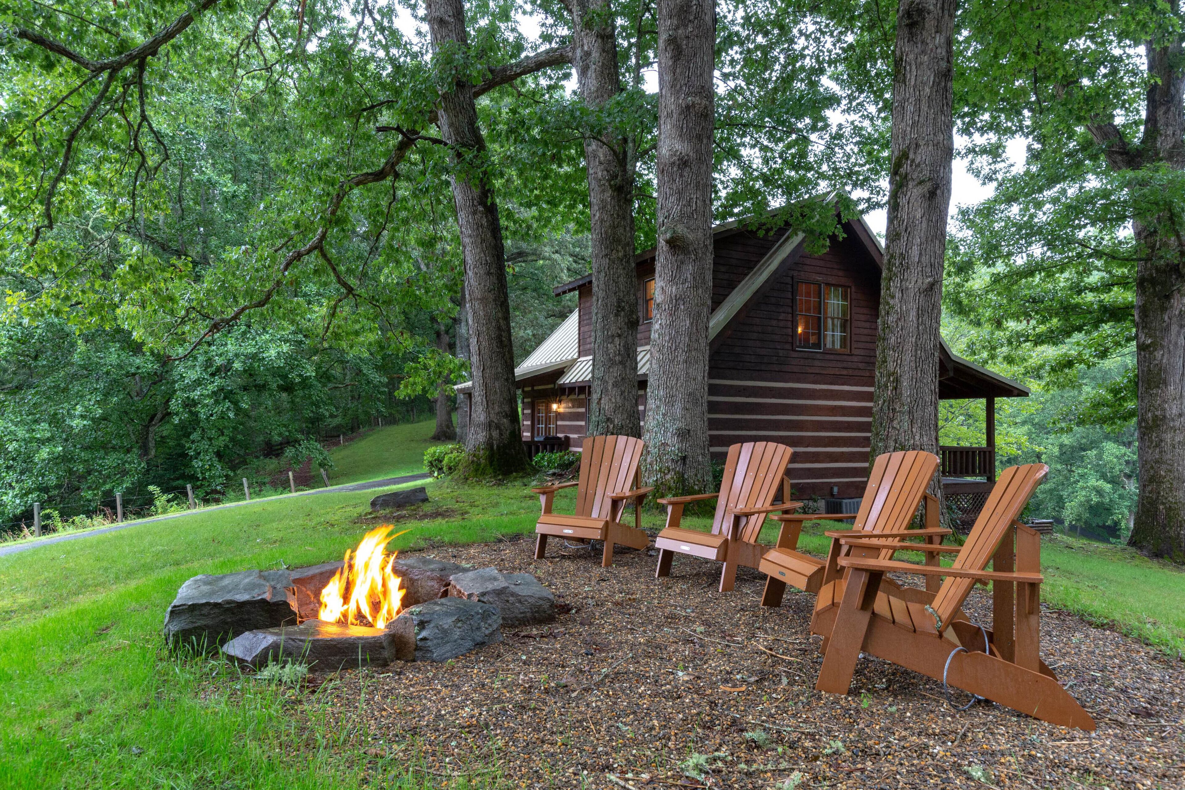 Classic log cabin home in private community - large porch & fireplace