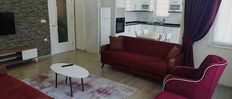 Apartment, 2 Bedrooms | Living room | 32-inch LED TV with satellite channels, TV