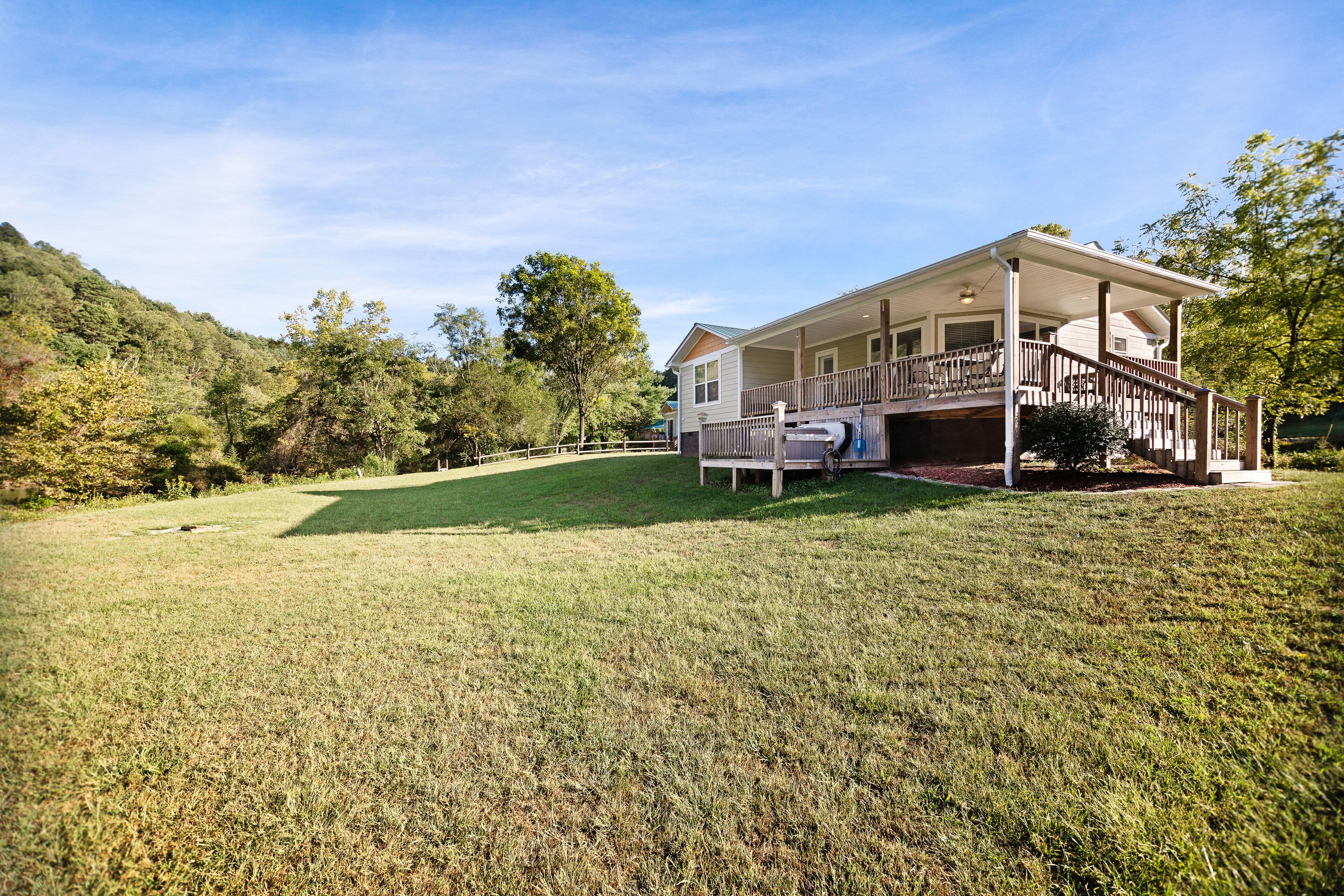 Cozy home w/ deck, fireplace & hot tub - riverfront access