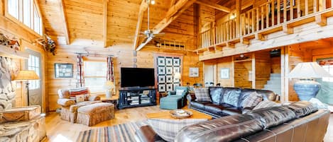 Téléviseur, foyer, lecteur de DVD, livres