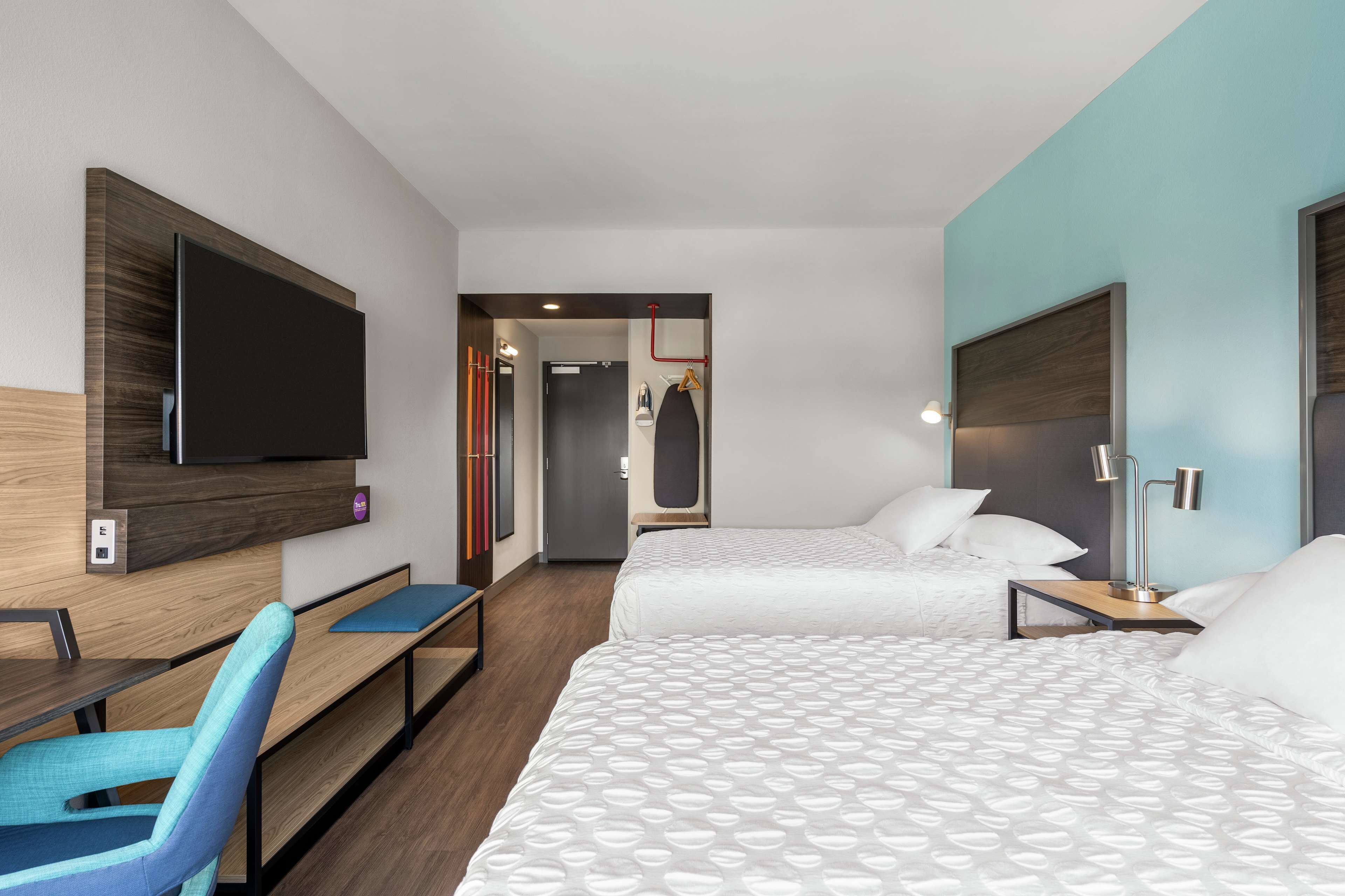 premium bedding, desk, laptop workspace, blackout curtains