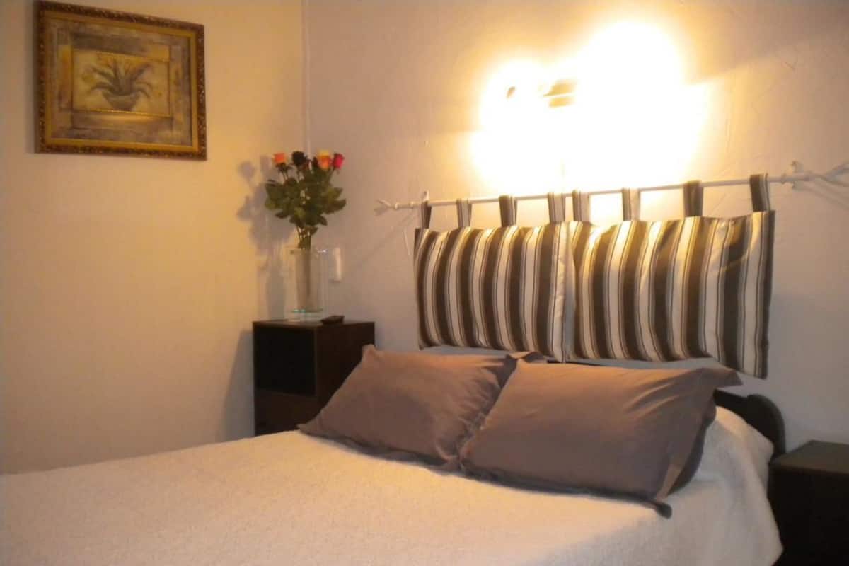 Double Room, Mountain View | Desk, blackout drapes, iron/ironing board (on request), cribs (free)
