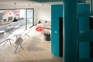 Panoramic Room, 2 Bedrooms | Living area | 32-inch flat-screen TV with cable channels, TV