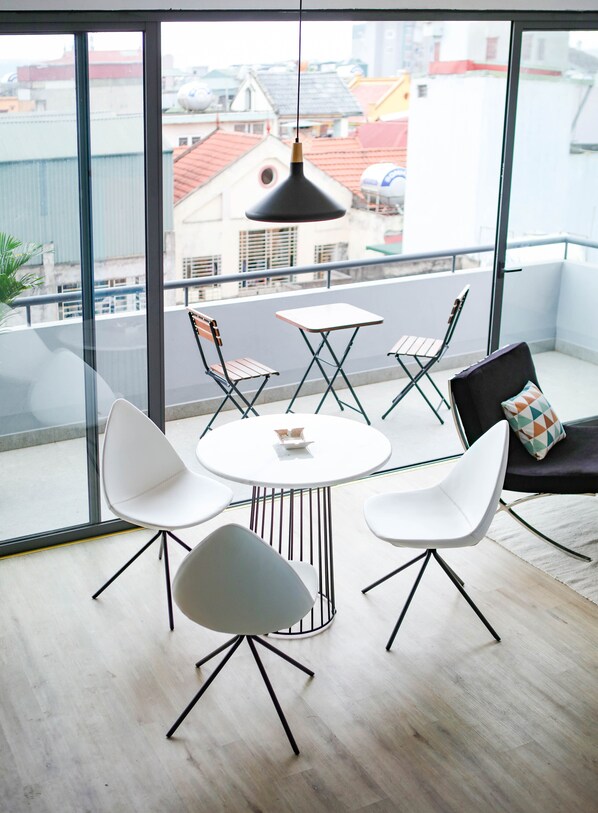 Panoramic Room, 2 Bedrooms | Living area | 32-inch flat-screen TV with cable channels, TV
