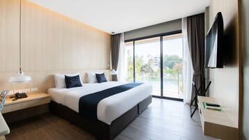 Deluxe Double Room, Pool Access | Minibar, in-room safe, desk, free WiFi