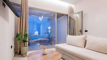 Suite estudio, vista al mar | Caja de seguridad en la habitación, wifi gratis y ropa de cama