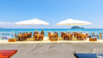 Breakfast, lunch, dinner served; Greek cuisine, beach views