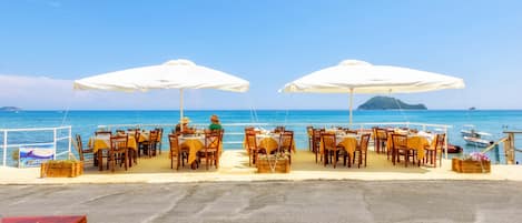 Breakfast, lunch, dinner served; Greek cuisine, beach views