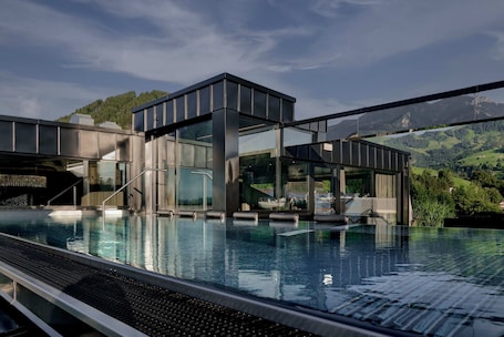 2 indoor pools, 2 outdoor pools, open 7:00 AM to 7:00 PM, pool umbrellas