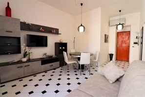 Lejlighed - 1 soveværelse - balkon - ved stranden | Stue | Fladskærms-tv