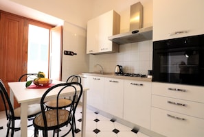 Appartement, 1 chambre, balcon, en bord de plage | Cuisine privée