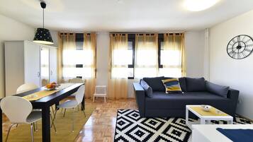 Apartment, 2 Bedrooms | Living area | Flat-screen TV