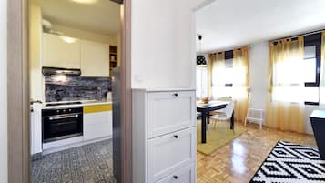 Apartment, 2 Bedrooms | Living area | Flat-screen TV