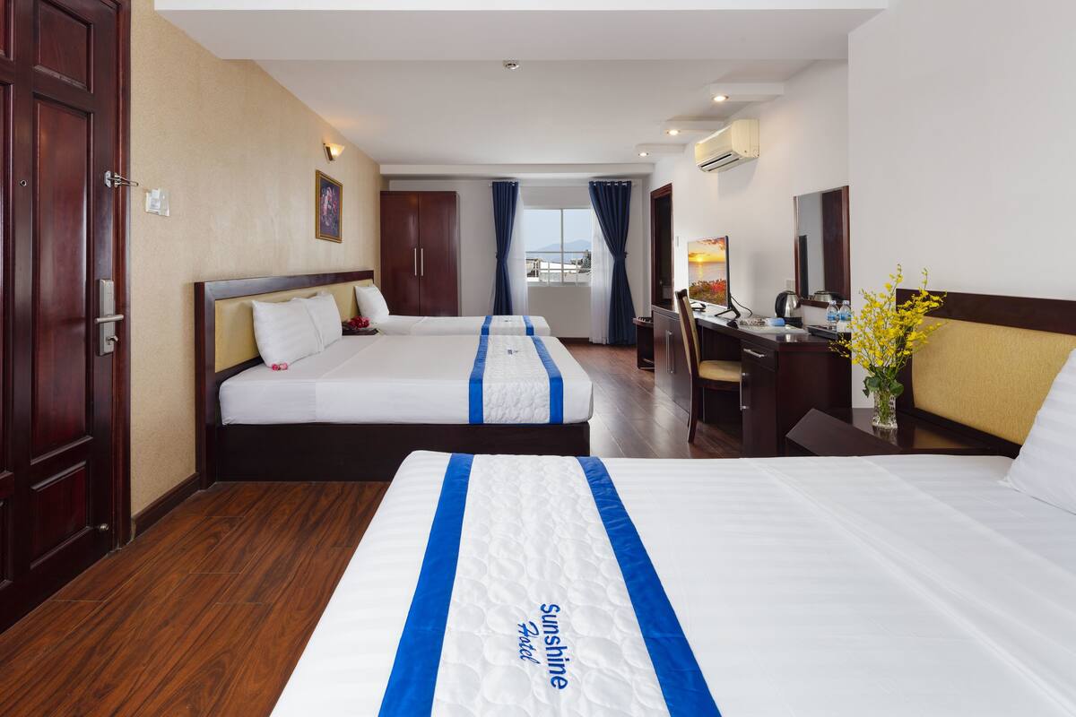 Family Room | Minibar, in-room safe, desk, iron/ironing board