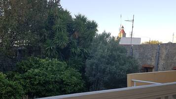 Standard Triple Room, Multiple Beds, City View | Terrace/patio