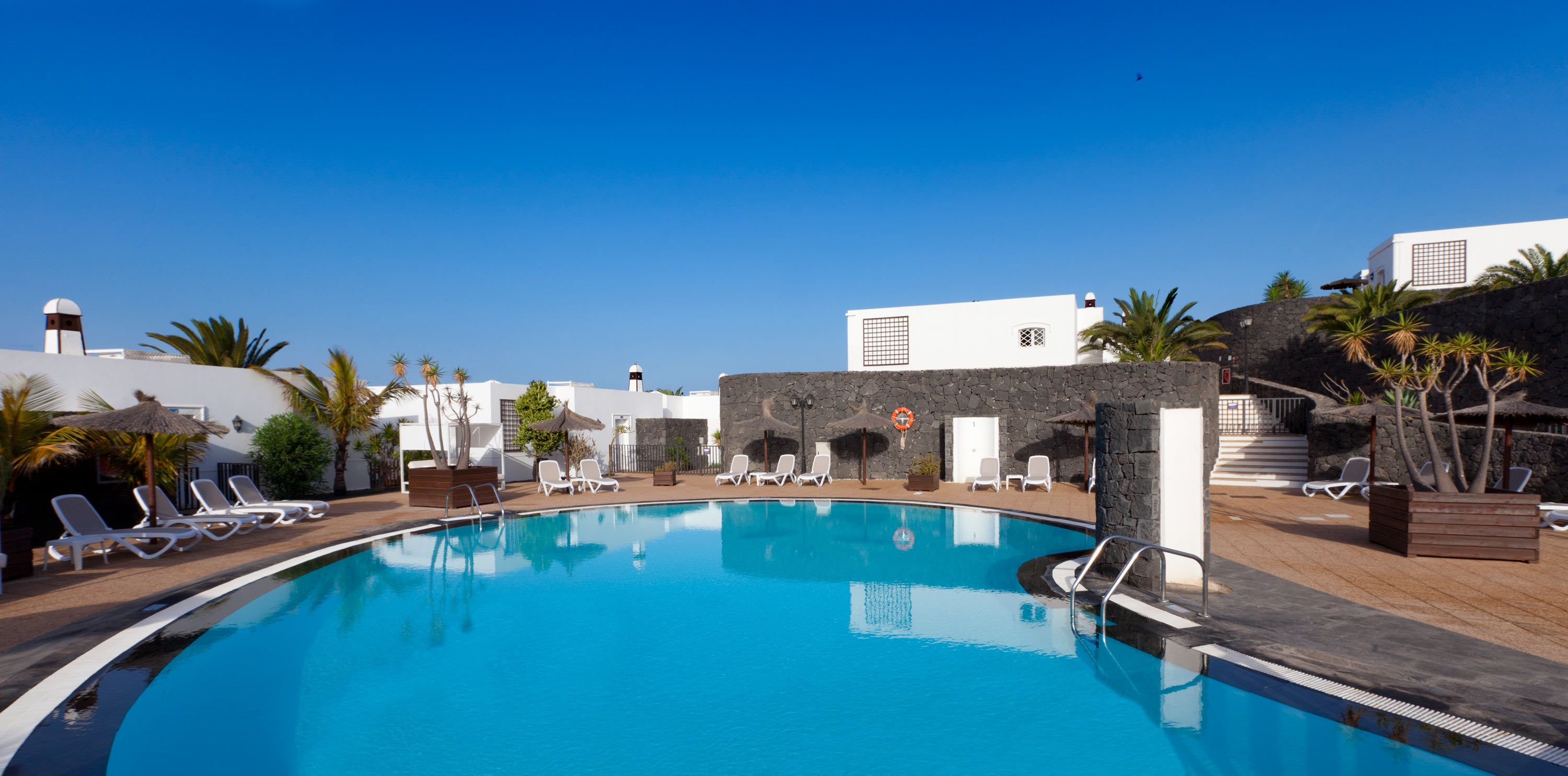 Outdoor pool, pool umbrellas, pool loungers