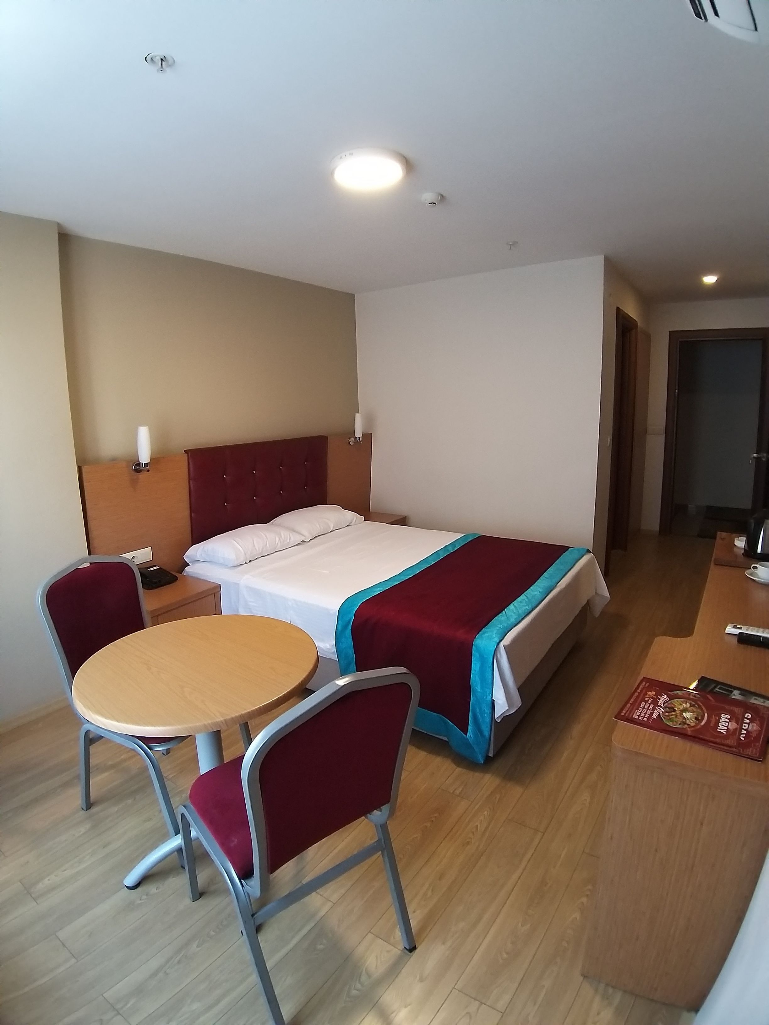 standard double room | living area | 102-inch lcd tv with satellite channels, tv