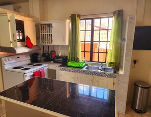 Fridge, microwave, oven, stovetop - Stewart Hotel Apt - Trincity, Airport, Full Apt (Trincity)