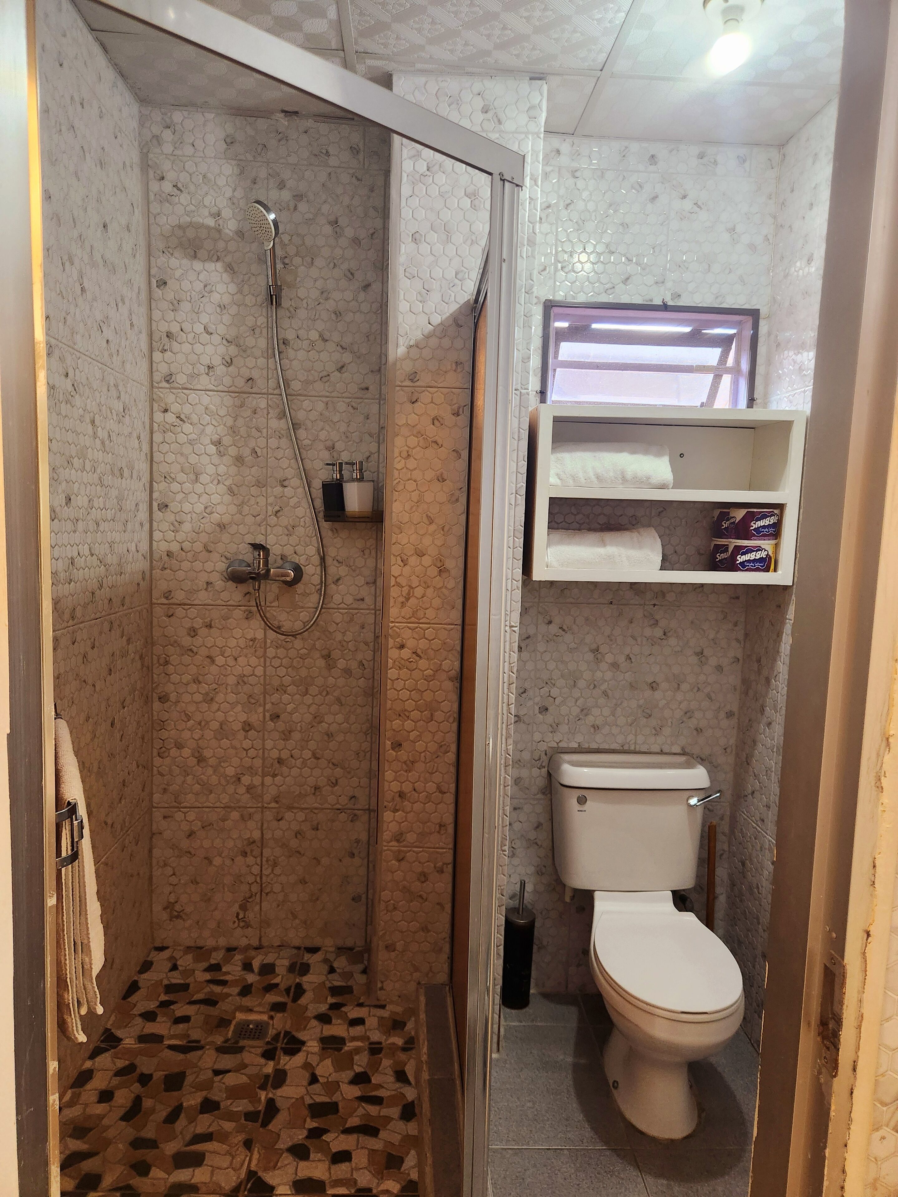 Shower, free toiletries, hair dryer, towels