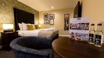 Select Comfort beds, desk, laptop workspace, iron/ironing board