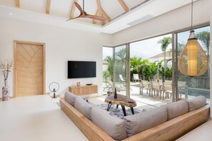 Family Villa, 3 Bedrooms, Private Pool, Garden View | Living room | Smart TV - Trichada Tropical  by Rents In Phuket (Choeng Thale)