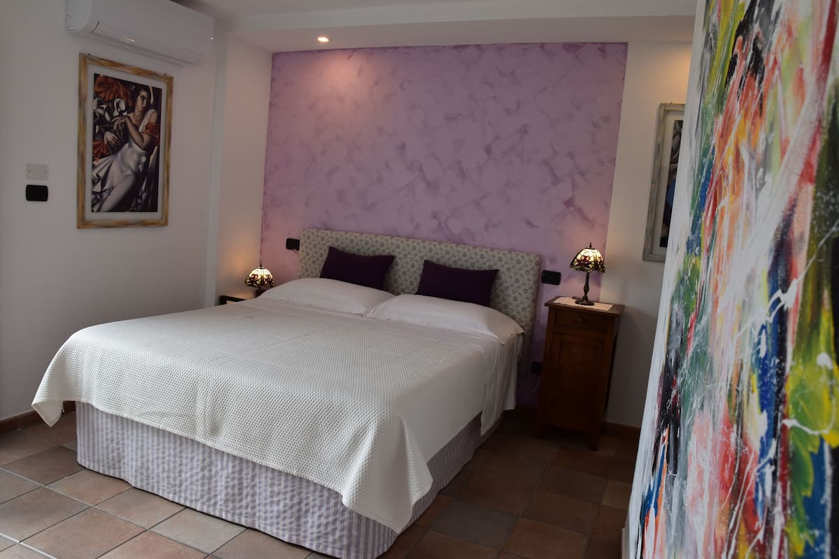 Suite, vue ville | Draps italiens Frette, literie de qualité supérieure