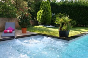 Outdoor pool, pool umbrellas, pool loungers