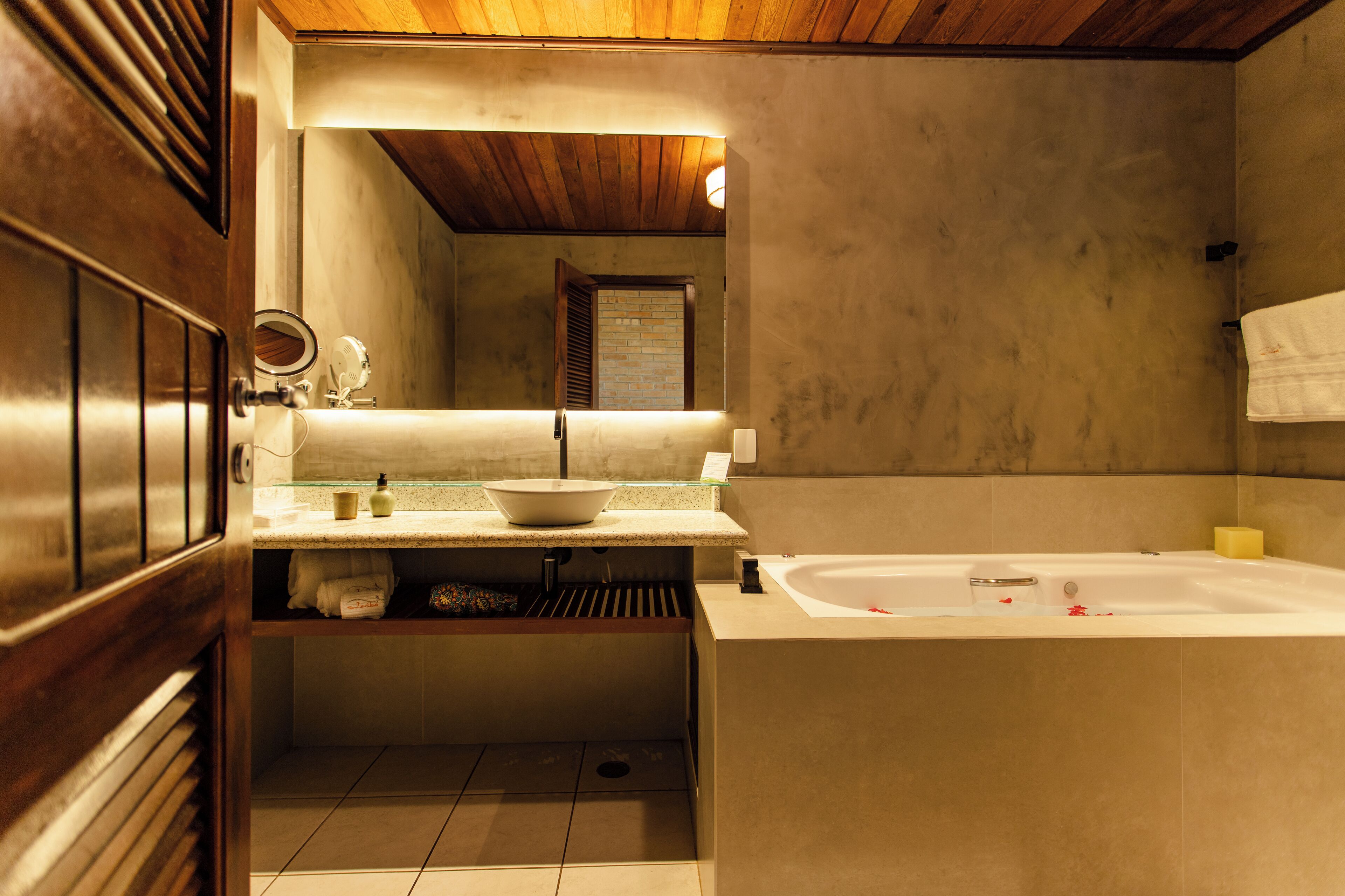 designer toiletries, hair dryer, towels, soap