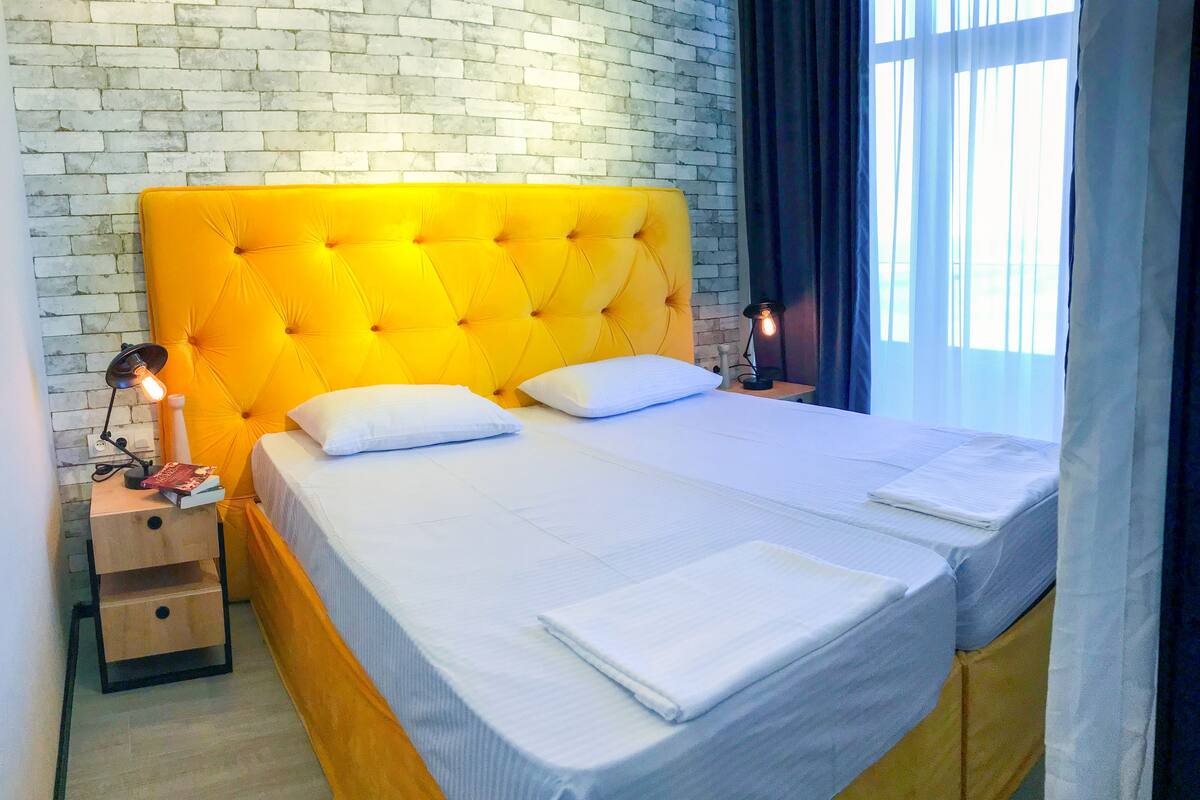 Standard Twin Room, Sea View | In-room safe, desk, laptop workspace, blackout curtains