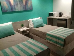 Habitación Confort con 2 camas individuales | Ropa de cama de alta calidad y caja de seguridad en la habitación 