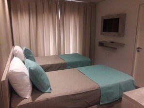 Comfort Twin kamer, 2 eenpersoonsbedden | Luxe beddengoed, een kluis op de kamer, individueel gedecoreerd