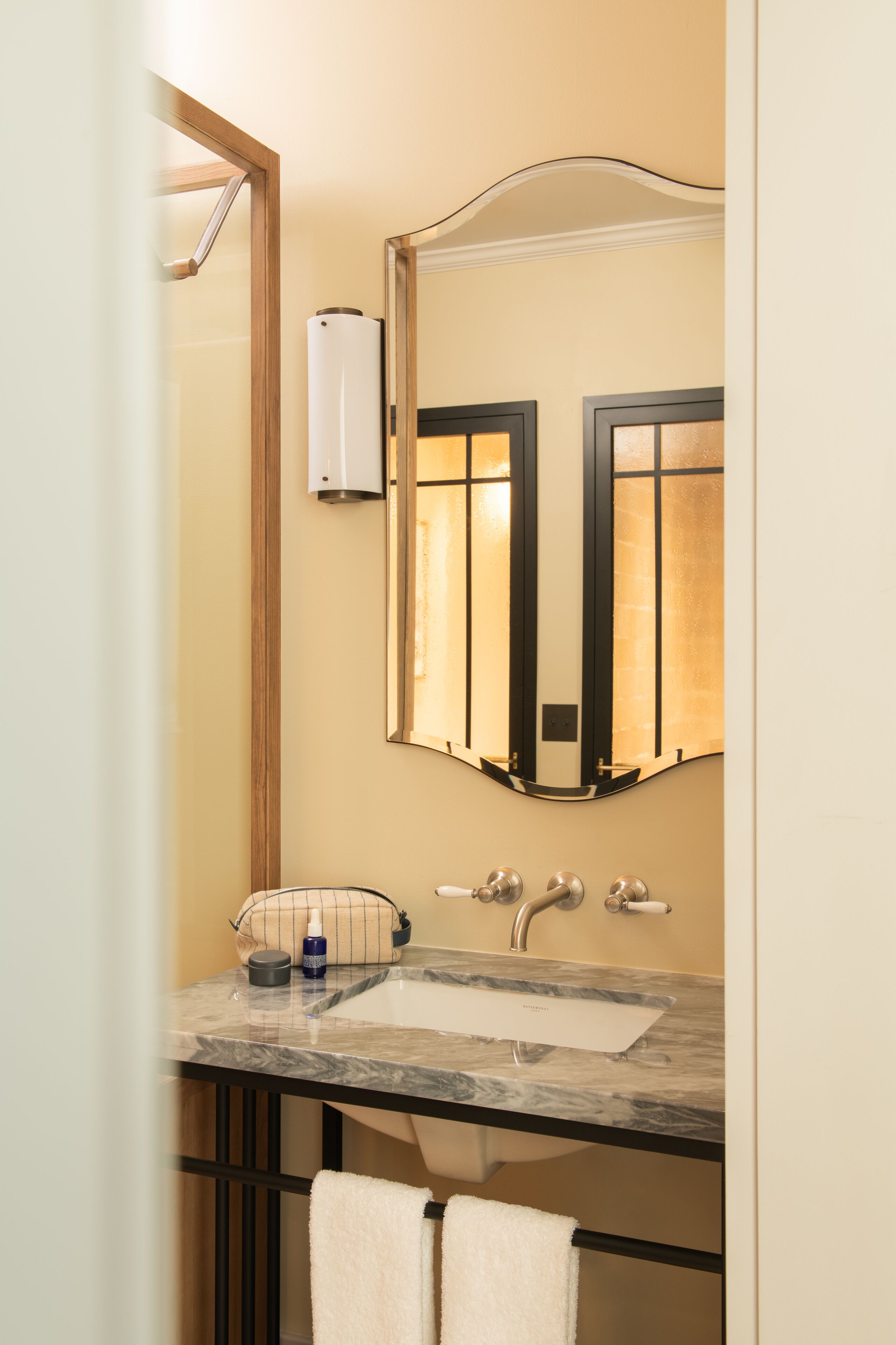 designer toiletries, hair dryer, towels, soap